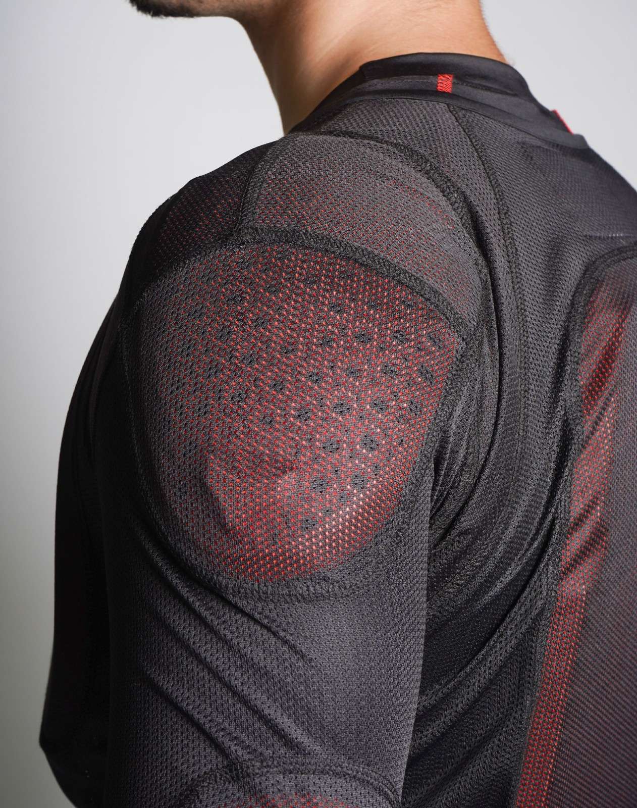 Side profile of DSG Bionic Plus Armour showing shoulder and elbow protector alignment